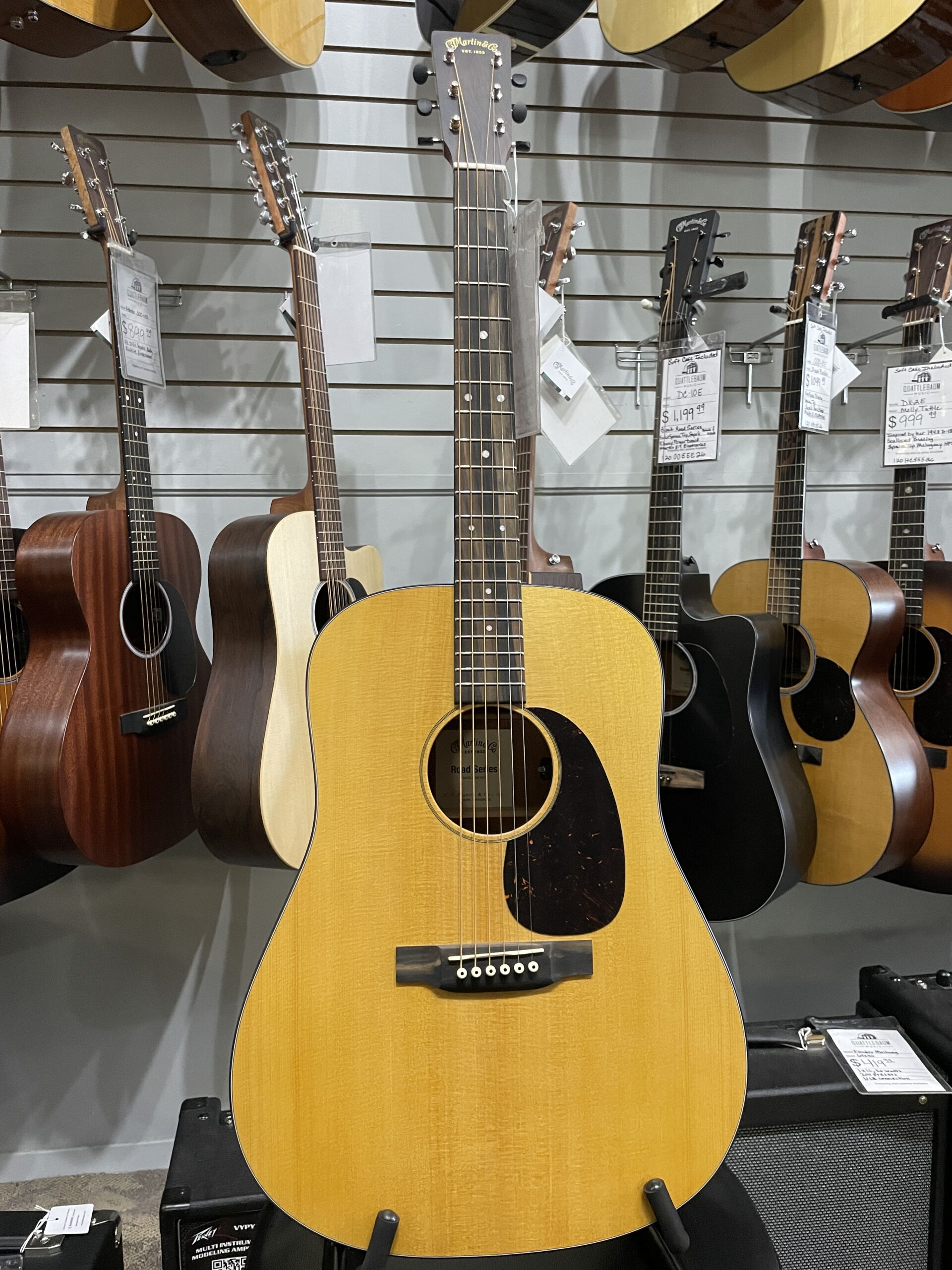 Martin Road Series D-10E Retro 2026 - AgMartin Road Series D-10E Retro – Aging Toner SOFTCASE INCLUDED The Martin D-10E Retro captures the essence of a classic Martin dreadnought while incorporating modern features designed for today's musicians. Built with a solid Sitka spruce top and solid sapele back and sides, it produces strong projection, warm mids, crisp highs, and excellent note definition. The vintage-inspired Aging Toner finish gives the guitar the appearance of a well-loved instrument right out of the case, while the satin finish enhances resonance and provides a comfortable playing feel. Martin's scalloped bracing allows the top to move freely, resulting in impressive volume and responsiveness. Equipped with Martin E-1 electronics and an onboard tuner, the D-10E Retro is ready for live performance, recording sessions, or worship settings. The Performing Artist neck profile and High-Performance Taper make it comfortable for both rhythm and lead playing. Whether you're a singer-songwriter, bluegrass picker, worship leader, or weekend performer, the D-10E Retro offers authentic Martin craftsmanship and tone at a price that's hard to beat. Specifications Body Size: Dreadnought (D-14 Fret) Top: Solid Sitka Spruce Back & Sides: Solid Sapele Bracing: Scalloped X-Bracing Neck: Select Hardwood Neck Profile: Performing Artist Profile Neck Taper: High-Performance Taper Scale Length: 25.4" Fingerboard: FSC Certified Richlite Bridge: FSC Certified Richlite Nut Width: 1-3/4" (44.5mm) Nut Material: White Corian Saddle: Compensated White Tusq Electronics: Martin E-1 Electronics with Built-In Tuner Finish: Satin Aging Toner Top / Satin Body Tuners: Chrome Enclosed Gear Case: Martin Softshell Gig Bag Made In: Nazareth, Pennsylvania, USAing Toner