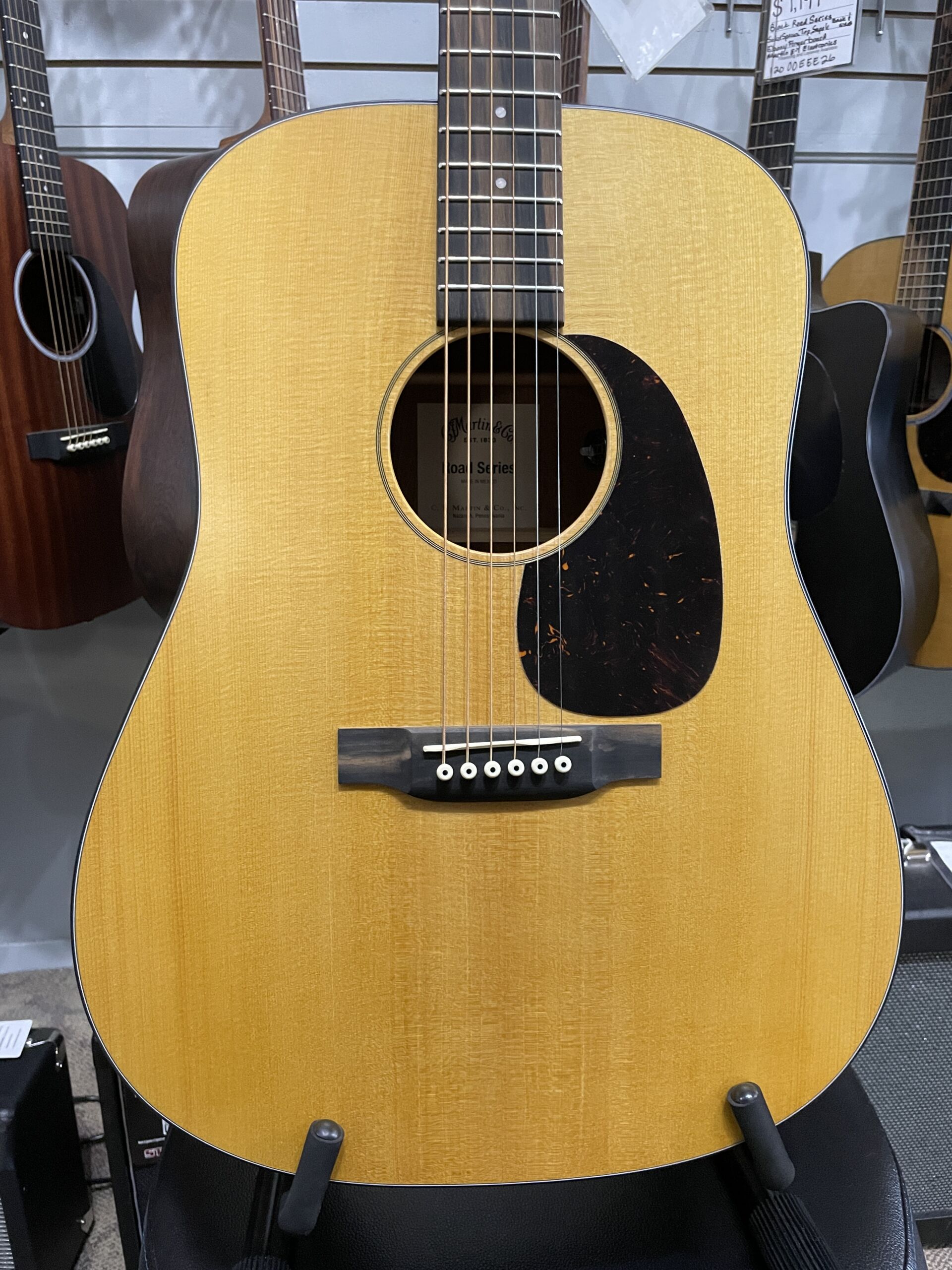 Martin Road Series D-10E Retro 2026 - AgMartin Road Series D-10E Retro – Aging Toner SOFTCASE INCLUDED The Martin D-10E Retro captures the essence of a classic Martin dreadnought while incorporating modern features designed for today's musicians. Built with a solid Sitka spruce top and solid sapele back and sides, it produces strong projection, warm mids, crisp highs, and excellent note definition. The vintage-inspired Aging Toner finish gives the guitar the appearance of a well-loved instrument right out of the case, while the satin finish enhances resonance and provides a comfortable playing feel. Martin's scalloped bracing allows the top to move freely, resulting in impressive volume and responsiveness. Equipped with Martin E-1 electronics and an onboard tuner, the D-10E Retro is ready for live performance, recording sessions, or worship settings. The Performing Artist neck profile and High-Performance Taper make it comfortable for both rhythm and lead playing. Whether you're a singer-songwriter, bluegrass picker, worship leader, or weekend performer, the D-10E Retro offers authentic Martin craftsmanship and tone at a price that's hard to beat. Specifications Body Size: Dreadnought (D-14 Fret) Top: Solid Sitka Spruce Back & Sides: Solid Sapele Bracing: Scalloped X-Bracing Neck: Select Hardwood Neck Profile: Performing Artist Profile Neck Taper: High-Performance Taper Scale Length: 25.4" Fingerboard: FSC Certified Richlite Bridge: FSC Certified Richlite Nut Width: 1-3/4" (44.5mm) Nut Material: White Corian Saddle: Compensated White Tusq Electronics: Martin E-1 Electronics with Built-In Tuner Finish: Satin Aging Toner Top / Satin Body Tuners: Chrome Enclosed Gear Case: Martin Softshell Gig Bag Made In: Nazareth, Pennsylvania, USAing Toner - Image 2