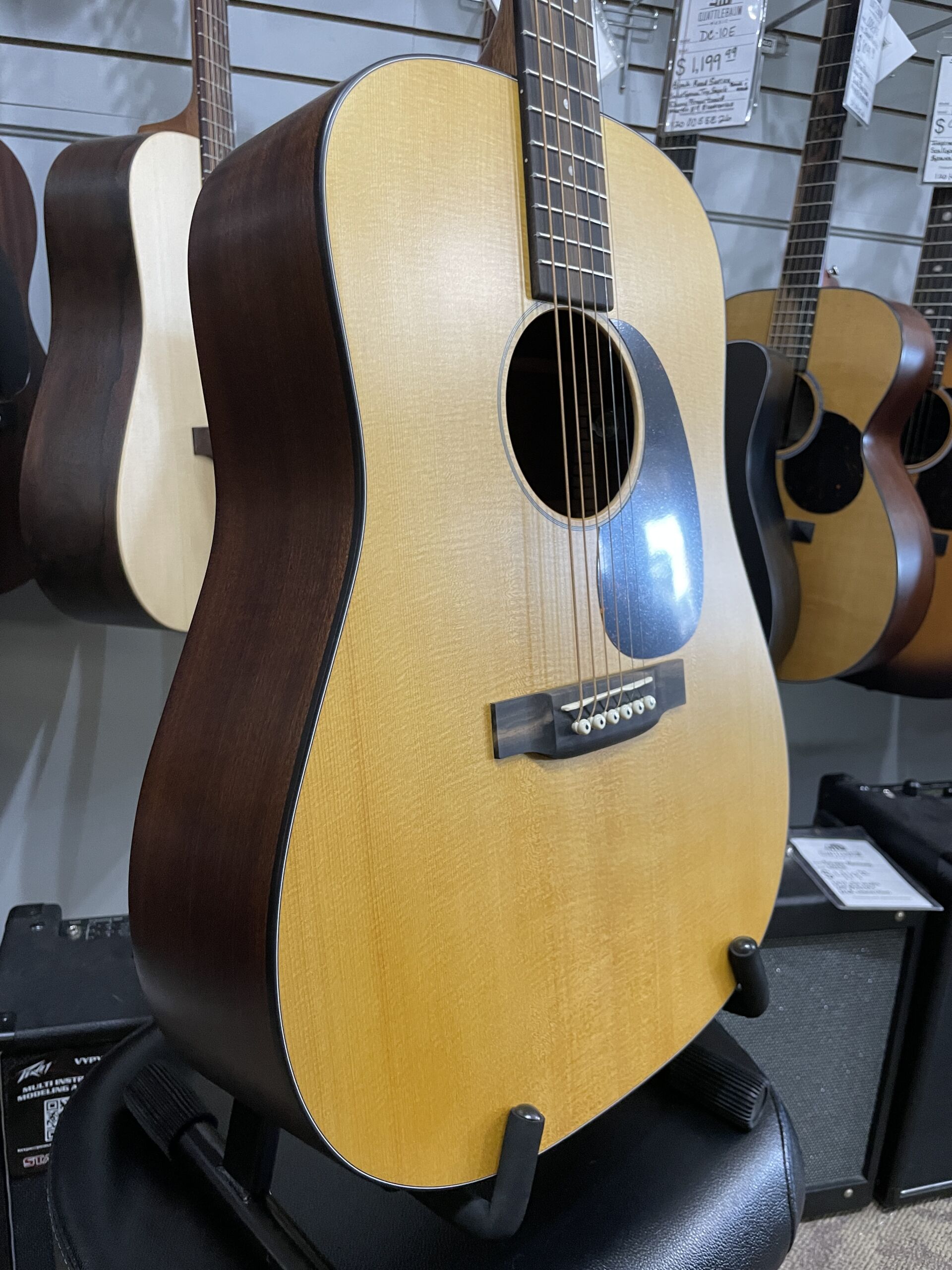 Martin Road Series D-10E Retro 2026 - AgMartin Road Series D-10E Retro – Aging Toner SOFTCASE INCLUDED The Martin D-10E Retro captures the essence of a classic Martin dreadnought while incorporating modern features designed for today's musicians. Built with a solid Sitka spruce top and solid sapele back and sides, it produces strong projection, warm mids, crisp highs, and excellent note definition. The vintage-inspired Aging Toner finish gives the guitar the appearance of a well-loved instrument right out of the case, while the satin finish enhances resonance and provides a comfortable playing feel. Martin's scalloped bracing allows the top to move freely, resulting in impressive volume and responsiveness. Equipped with Martin E-1 electronics and an onboard tuner, the D-10E Retro is ready for live performance, recording sessions, or worship settings. The Performing Artist neck profile and High-Performance Taper make it comfortable for both rhythm and lead playing. Whether you're a singer-songwriter, bluegrass picker, worship leader, or weekend performer, the D-10E Retro offers authentic Martin craftsmanship and tone at a price that's hard to beat. Specifications Body Size: Dreadnought (D-14 Fret) Top: Solid Sitka Spruce Back & Sides: Solid Sapele Bracing: Scalloped X-Bracing Neck: Select Hardwood Neck Profile: Performing Artist Profile Neck Taper: High-Performance Taper Scale Length: 25.4" Fingerboard: FSC Certified Richlite Bridge: FSC Certified Richlite Nut Width: 1-3/4" (44.5mm) Nut Material: White Corian Saddle: Compensated White Tusq Electronics: Martin E-1 Electronics with Built-In Tuner Finish: Satin Aging Toner Top / Satin Body Tuners: Chrome Enclosed Gear Case: Martin Softshell Gig Bag Made In: Nazareth, Pennsylvania, USAing Toner - Image 4
