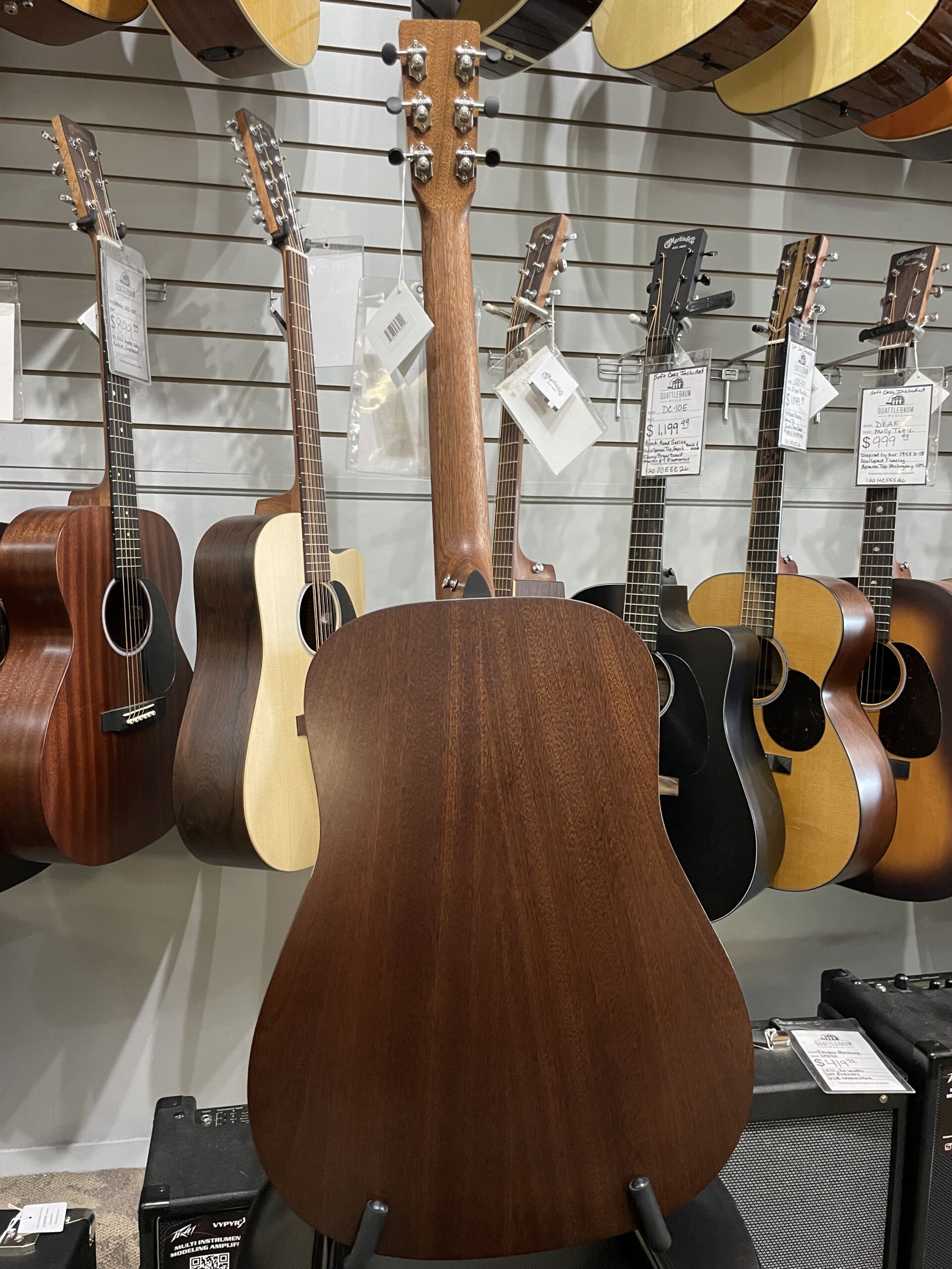 Martin Road Series D-10E Retro 2026 - AgMartin Road Series D-10E Retro – Aging Toner SOFTCASE INCLUDED The Martin D-10E Retro captures the essence of a classic Martin dreadnought while incorporating modern features designed for today's musicians. Built with a solid Sitka spruce top and solid sapele back and sides, it produces strong projection, warm mids, crisp highs, and excellent note definition. The vintage-inspired Aging Toner finish gives the guitar the appearance of a well-loved instrument right out of the case, while the satin finish enhances resonance and provides a comfortable playing feel. Martin's scalloped bracing allows the top to move freely, resulting in impressive volume and responsiveness. Equipped with Martin E-1 electronics and an onboard tuner, the D-10E Retro is ready for live performance, recording sessions, or worship settings. The Performing Artist neck profile and High-Performance Taper make it comfortable for both rhythm and lead playing. Whether you're a singer-songwriter, bluegrass picker, worship leader, or weekend performer, the D-10E Retro offers authentic Martin craftsmanship and tone at a price that's hard to beat. Specifications Body Size: Dreadnought (D-14 Fret) Top: Solid Sitka Spruce Back & Sides: Solid Sapele Bracing: Scalloped X-Bracing Neck: Select Hardwood Neck Profile: Performing Artist Profile Neck Taper: High-Performance Taper Scale Length: 25.4" Fingerboard: FSC Certified Richlite Bridge: FSC Certified Richlite Nut Width: 1-3/4" (44.5mm) Nut Material: White Corian Saddle: Compensated White Tusq Electronics: Martin E-1 Electronics with Built-In Tuner Finish: Satin Aging Toner Top / Satin Body Tuners: Chrome Enclosed Gear Case: Martin Softshell Gig Bag Made In: Nazareth, Pennsylvania, USAing Toner - Image 6