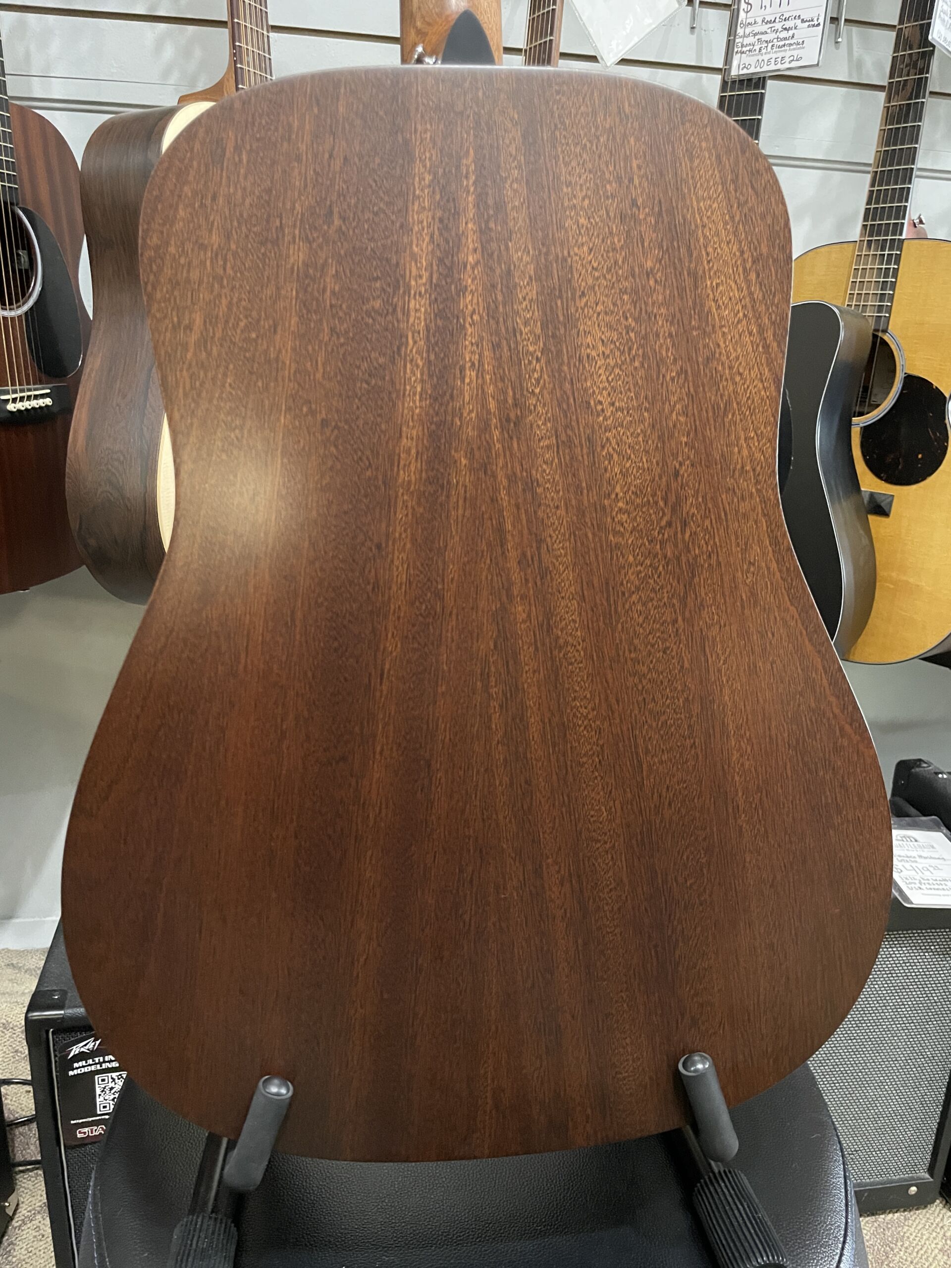 Martin Road Series D-10E Retro 2026 - AgMartin Road Series D-10E Retro – Aging Toner SOFTCASE INCLUDED The Martin D-10E Retro captures the essence of a classic Martin dreadnought while incorporating modern features designed for today's musicians. Built with a solid Sitka spruce top and solid sapele back and sides, it produces strong projection, warm mids, crisp highs, and excellent note definition. The vintage-inspired Aging Toner finish gives the guitar the appearance of a well-loved instrument right out of the case, while the satin finish enhances resonance and provides a comfortable playing feel. Martin's scalloped bracing allows the top to move freely, resulting in impressive volume and responsiveness. Equipped with Martin E-1 electronics and an onboard tuner, the D-10E Retro is ready for live performance, recording sessions, or worship settings. The Performing Artist neck profile and High-Performance Taper make it comfortable for both rhythm and lead playing. Whether you're a singer-songwriter, bluegrass picker, worship leader, or weekend performer, the D-10E Retro offers authentic Martin craftsmanship and tone at a price that's hard to beat. Specifications Body Size: Dreadnought (D-14 Fret) Top: Solid Sitka Spruce Back & Sides: Solid Sapele Bracing: Scalloped X-Bracing Neck: Select Hardwood Neck Profile: Performing Artist Profile Neck Taper: High-Performance Taper Scale Length: 25.4" Fingerboard: FSC Certified Richlite Bridge: FSC Certified Richlite Nut Width: 1-3/4" (44.5mm) Nut Material: White Corian Saddle: Compensated White Tusq Electronics: Martin E-1 Electronics with Built-In Tuner Finish: Satin Aging Toner Top / Satin Body Tuners: Chrome Enclosed Gear Case: Martin Softshell Gig Bag Made In: Nazareth, Pennsylvania, USAing Toner - Image 7