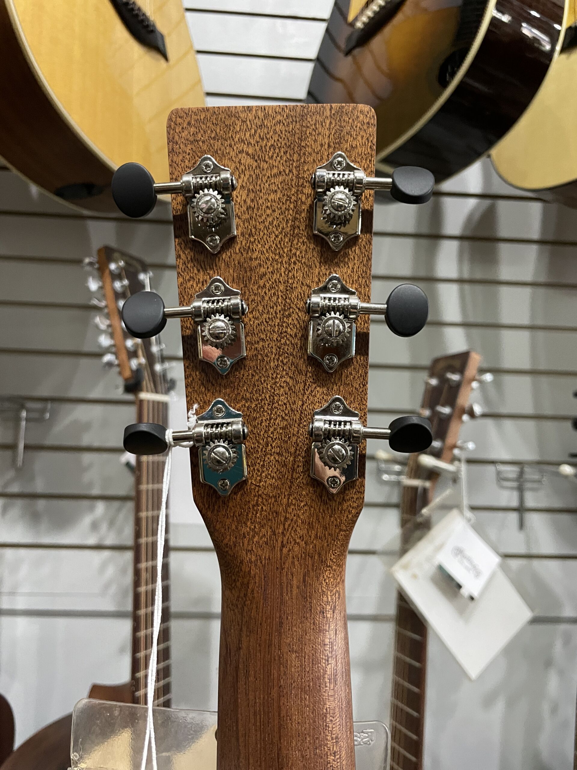Martin Road Series D-10E Retro 2026 - AgMartin Road Series D-10E Retro – Aging Toner SOFTCASE INCLUDED The Martin D-10E Retro captures the essence of a classic Martin dreadnought while incorporating modern features designed for today's musicians. Built with a solid Sitka spruce top and solid sapele back and sides, it produces strong projection, warm mids, crisp highs, and excellent note definition. The vintage-inspired Aging Toner finish gives the guitar the appearance of a well-loved instrument right out of the case, while the satin finish enhances resonance and provides a comfortable playing feel. Martin's scalloped bracing allows the top to move freely, resulting in impressive volume and responsiveness. Equipped with Martin E-1 electronics and an onboard tuner, the D-10E Retro is ready for live performance, recording sessions, or worship settings. The Performing Artist neck profile and High-Performance Taper make it comfortable for both rhythm and lead playing. Whether you're a singer-songwriter, bluegrass picker, worship leader, or weekend performer, the D-10E Retro offers authentic Martin craftsmanship and tone at a price that's hard to beat. Specifications Body Size: Dreadnought (D-14 Fret) Top: Solid Sitka Spruce Back & Sides: Solid Sapele Bracing: Scalloped X-Bracing Neck: Select Hardwood Neck Profile: Performing Artist Profile Neck Taper: High-Performance Taper Scale Length: 25.4" Fingerboard: FSC Certified Richlite Bridge: FSC Certified Richlite Nut Width: 1-3/4" (44.5mm) Nut Material: White Corian Saddle: Compensated White Tusq Electronics: Martin E-1 Electronics with Built-In Tuner Finish: Satin Aging Toner Top / Satin Body Tuners: Chrome Enclosed Gear Case: Martin Softshell Gig Bag Made In: Nazareth, Pennsylvania, USAing Toner - Image 8